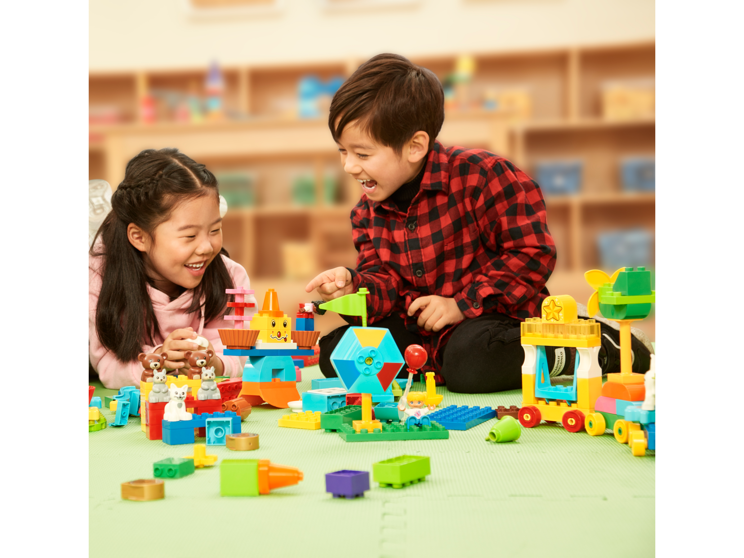 Students working together on kindergarten STEAM projects